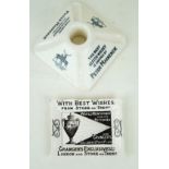 Two pieces of ceramic advertising To include a match striker and holder,