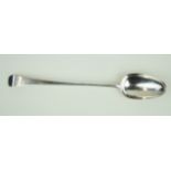 An 18th Century hallmarked silver basting spoon Of plain form with engraved initials to handle,