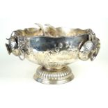 A large silver-plated pedestal punch bowl Having two lion mask head handles,