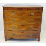 An early 19th Century mahogany bow front chest of drawers The four graduated cross banded drawers