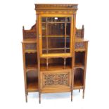 A late Victorian/Edwardian walnut break front side cabinet of small proportions The central pierced