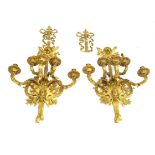 A pair of highly ornate period style cast gilt metal girandoles,