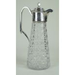 A silver-plated and cut glass claret jug The silver-plated mount and cover having chased decoration,