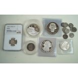 A collection of silver proof and silver coinage Includes a German silver medal commemorating the