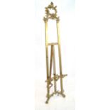 An ornate period style gilt metal easel, 20th Century Cast in a neoclassical taste,