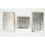 Three Art Deco hallmarked silver cigarette cases Each with engine turned decoration and rectangular