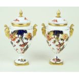 A pair of Coalport 'Hong Kong' pattern vases and covers Each of ovoid form,
