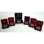 Five cased silver proof Canadian Mint dollars Comprising four dated 1984, half silver content,