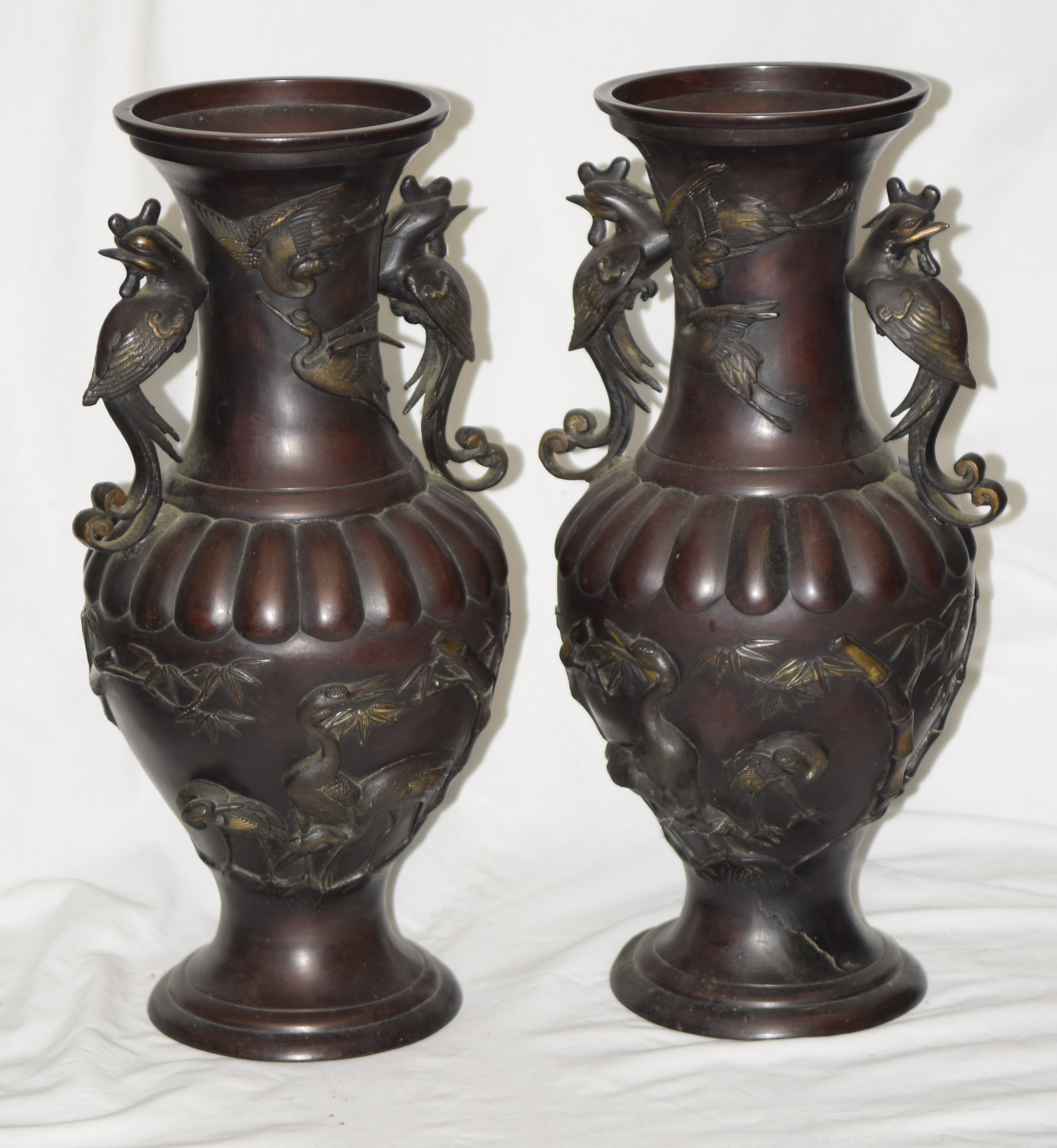 A pair of Japanese bronze vases, late Meiji period (1868-1912) With qilin handles height 46.