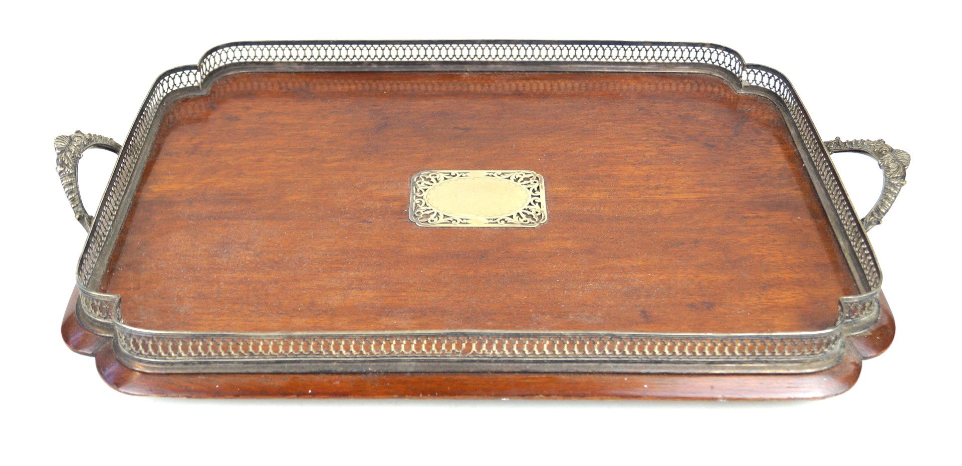 A 1920's oak and silver-plated twin handled butlers tray Having pierced gallery,