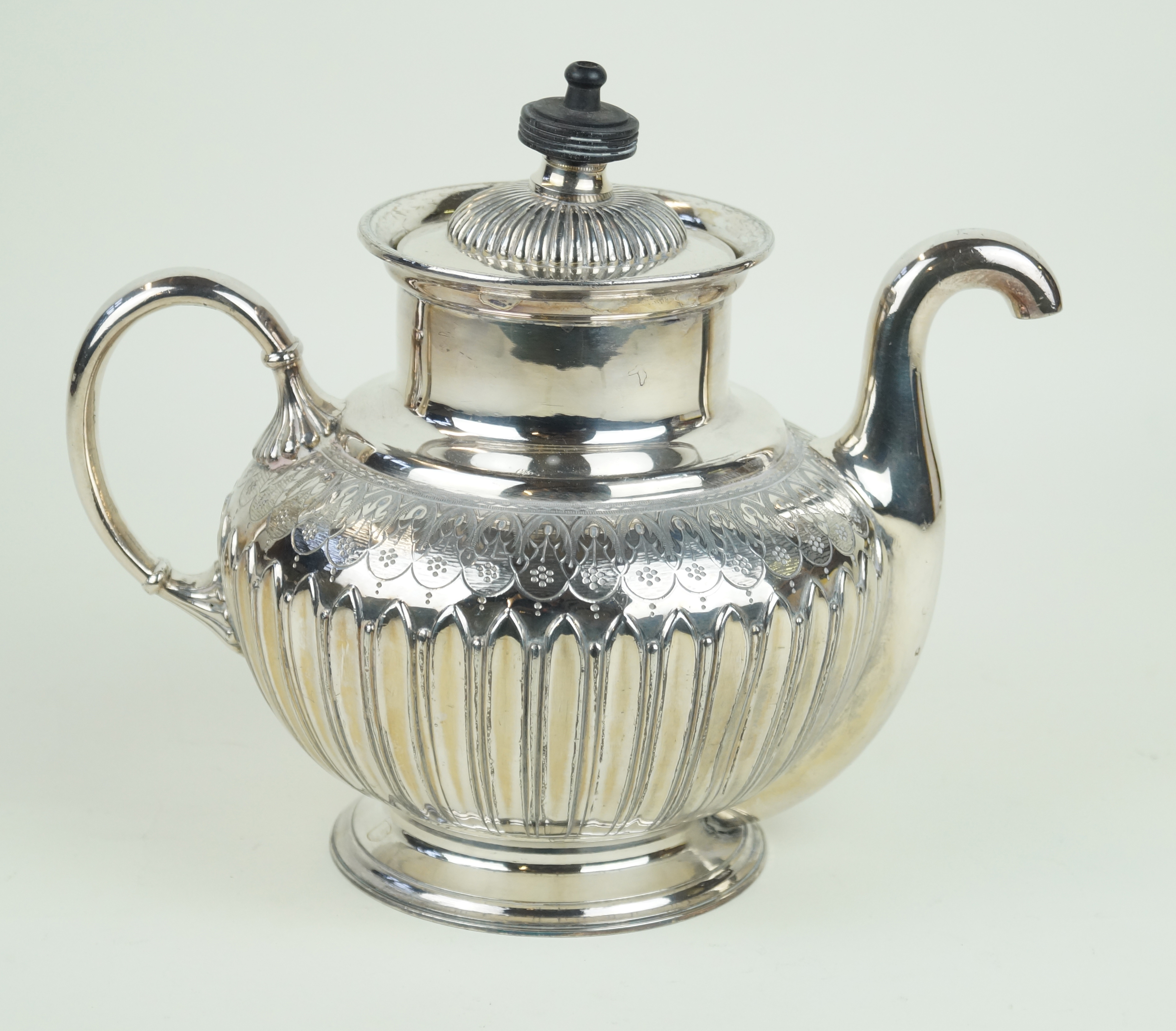 A 19th Century silver-plated Royles patent self pouring teapot Of bulbous form with cast and chased