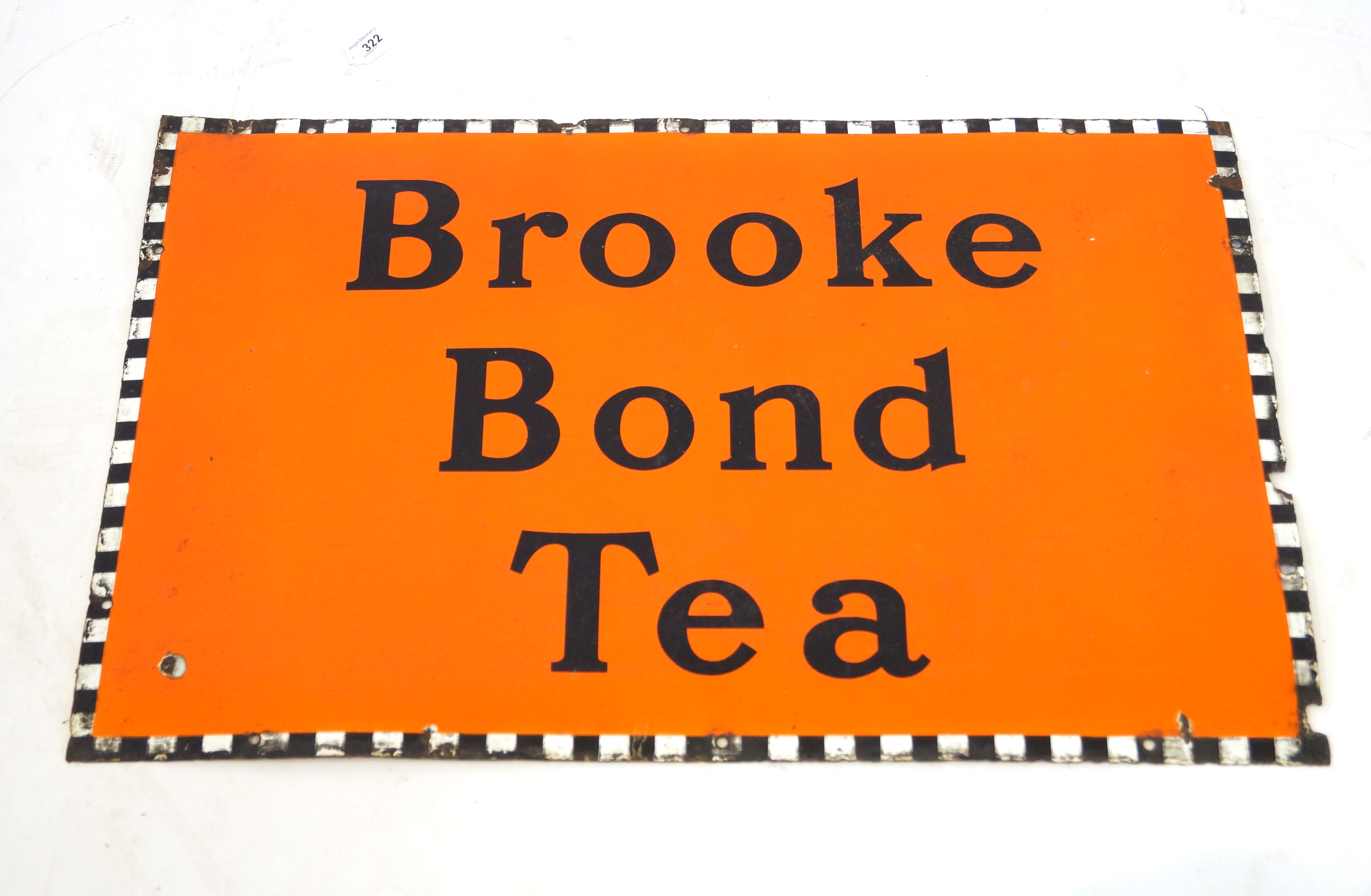 An original advertising enamel sign 'Brook Bond Tea' 50x77cm CONDITION REPORT: