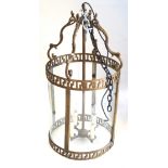 An ornate Georgian style gilt metal hanging lantern,