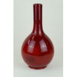 A large and impressive Royal Doulton Flambe vase Of bulbous form with cylindrical neck,