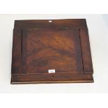 A Victorian mahogany clerks ledger box The hinged sloping top enclosing storage space,