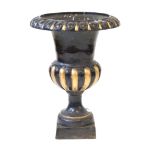 A Neoclassical revival cast iron garden urn The flared circular rim cast in relief with egg and