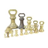 A collection of assorted brass bell and further weights Various manufactures and sizes to include