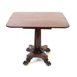 A early Victorian mahogany tea table The hinged and swivel rectangular top with front rounded