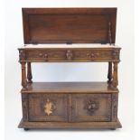 A carved oak buffet, circa 1900 The rectangular top with carved borders,