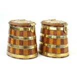 A pair of highly decorative brass bound oak storage boxes 19th Century, each of tapering oval form,