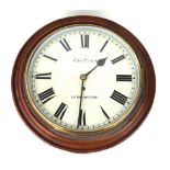 A 19th Century mahogany cased school / station wall clock The circular 30cm painted dial with Roman