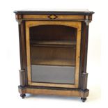 A Victorian inlaid and cross banded walnut veneered and ebonised pier cabinet applied with gilt