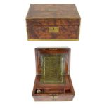 An early Victorian brass bound writing slope The hinged cover lifts to reveal green leather slope