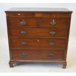 A late Georgian parquetry inlaid mahogany straight front chest of drawers The rectangular top with