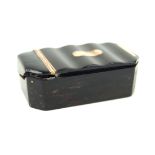 A Georgian tortoiseshell snuff box of shaped rectangular form Having yellow metal hinge and