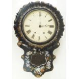 A Victorian papier mache wall clock The circular painted dial with Roman numerals,