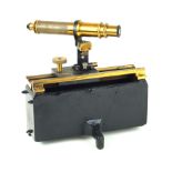 A Becker of London mounted brass telescope With adjustable turning mount, with ruler measurement,