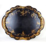 A Victorian Jennens & Bettridge of Birmingham papier mache tray Painted in gilt with floral sprays