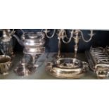 A quantity of assorted silver-plate to include tea kettle on stand, pair of candlesticks,