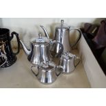 A contemporary Japanese stainless steel tea service.