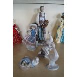 Six Lladro figurines to include The Artist, Oliver Kitten seated, etc.