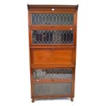 An early 20th Century mahogany stacking bureau bookcase in the manner of Globe Wernicke Featuring