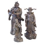 Three Chinese period style bronze figures,