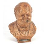 A 1940s cigarette lighter modelled in the form Of Sir Winston Churchill, modelled by Peter Lambda,