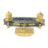 A highly decorative French gilt bronze and veined marble desk set In the Empire style,