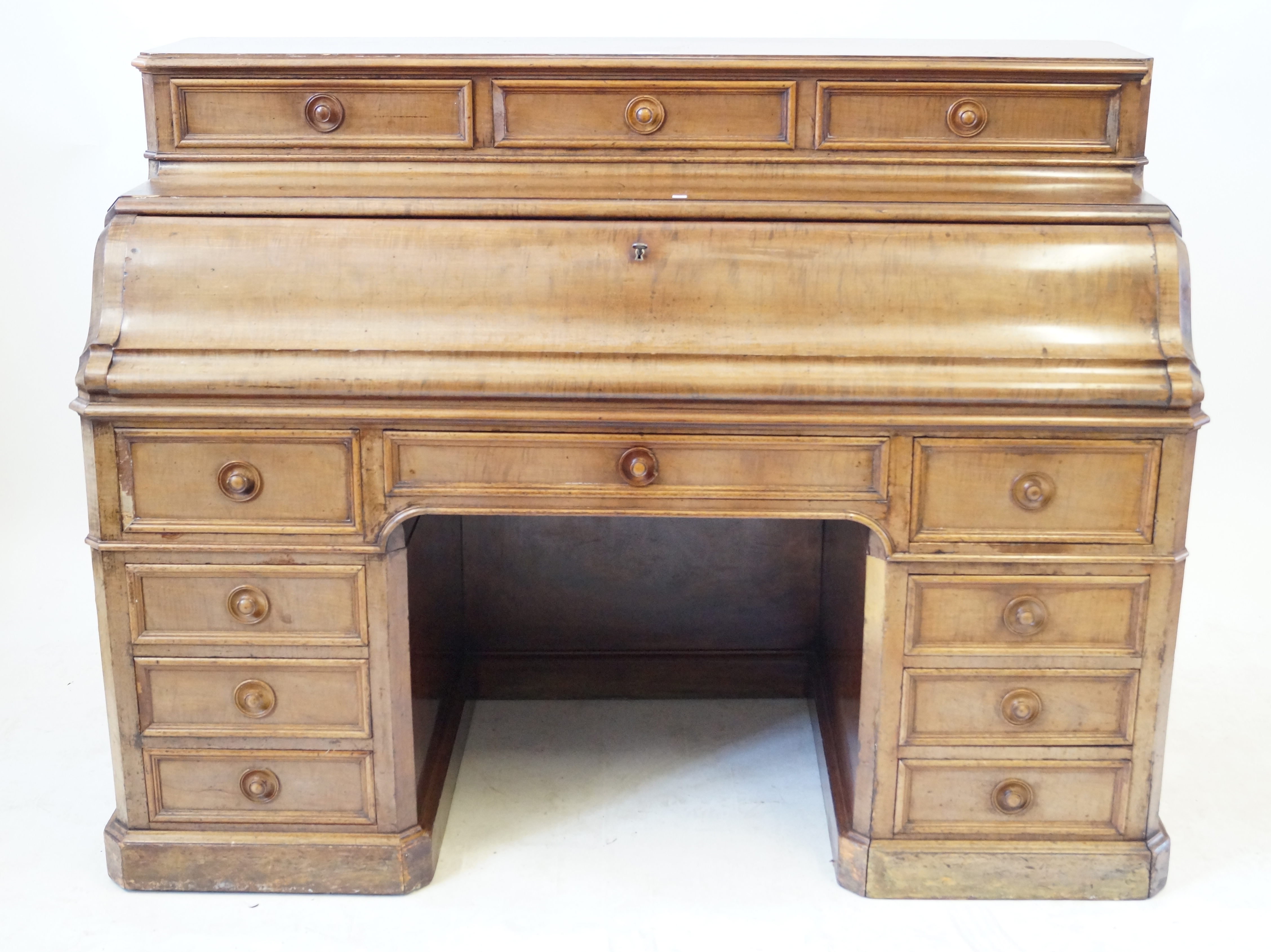 A good quality Victorian mahogany pedestal desk The raised super-structure incorporating three