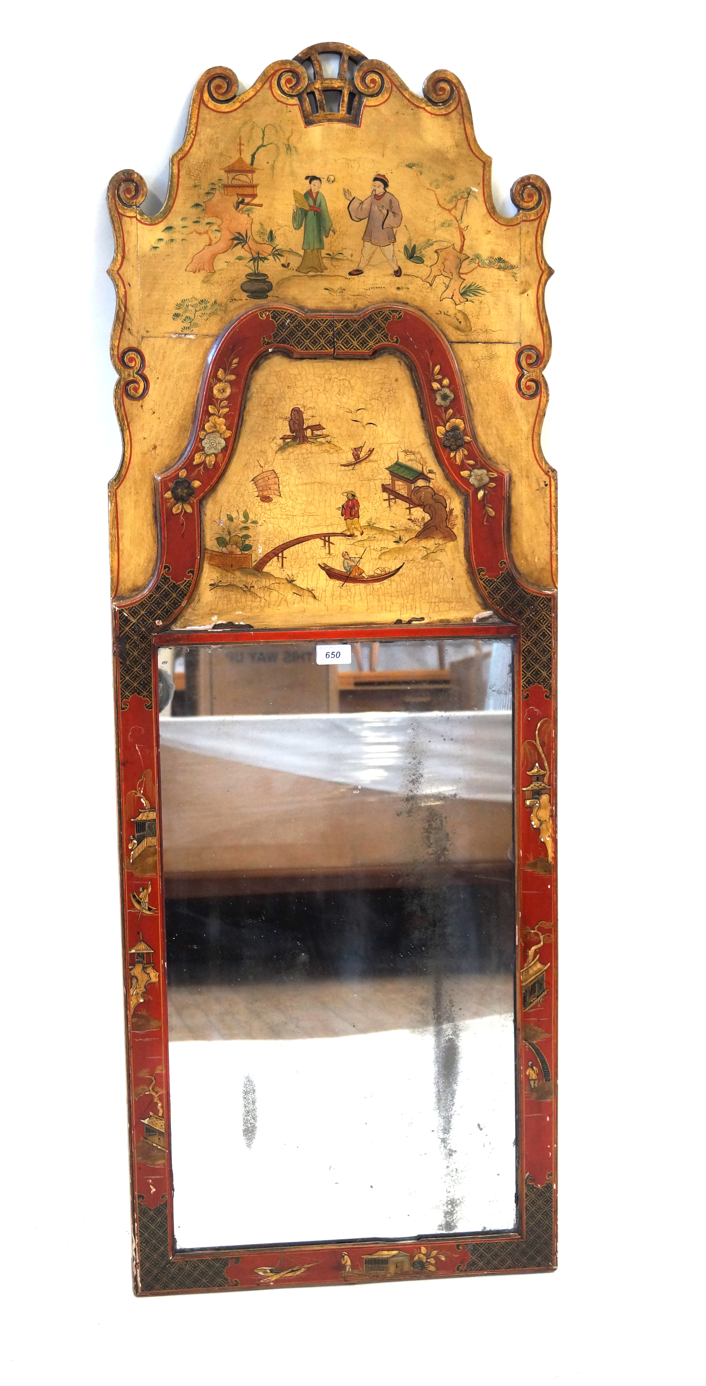 A highly decorative George II style lacquered wall mirror,