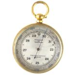 A brass cased pocket barometer The silvered dial marked compensated for temperature,