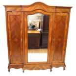 A French Period-style walnut armoire,