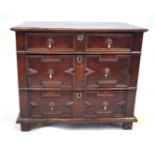 A 17th Century Jacobean oak chest of drawers The straight front featuring three graduated long