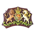 A painted cast iron wall plaque Depicting Queen Victoria Royal Coat of Arms,
