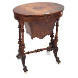 A Victorian marquetry inlaid and boxwood strung mahogany work table The pretty oval hinged top