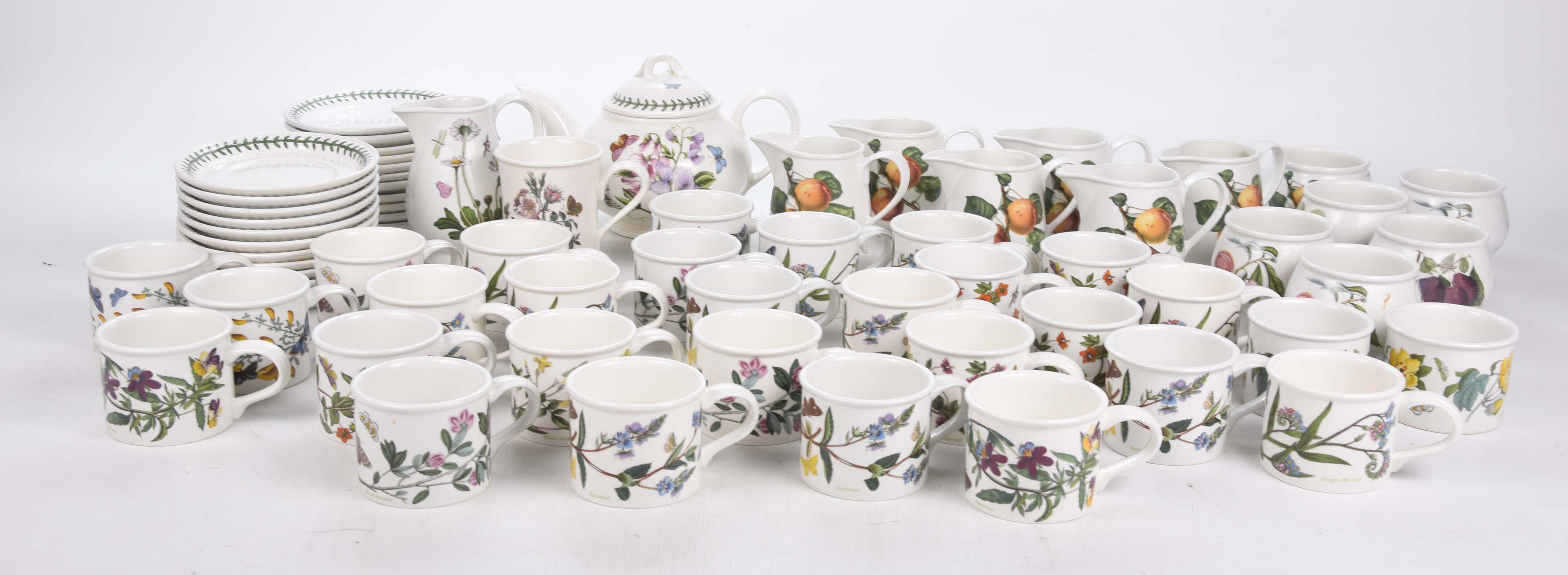 A large collection of Portmeirion Botanic Garden cups and saucers Along with a teapot and various