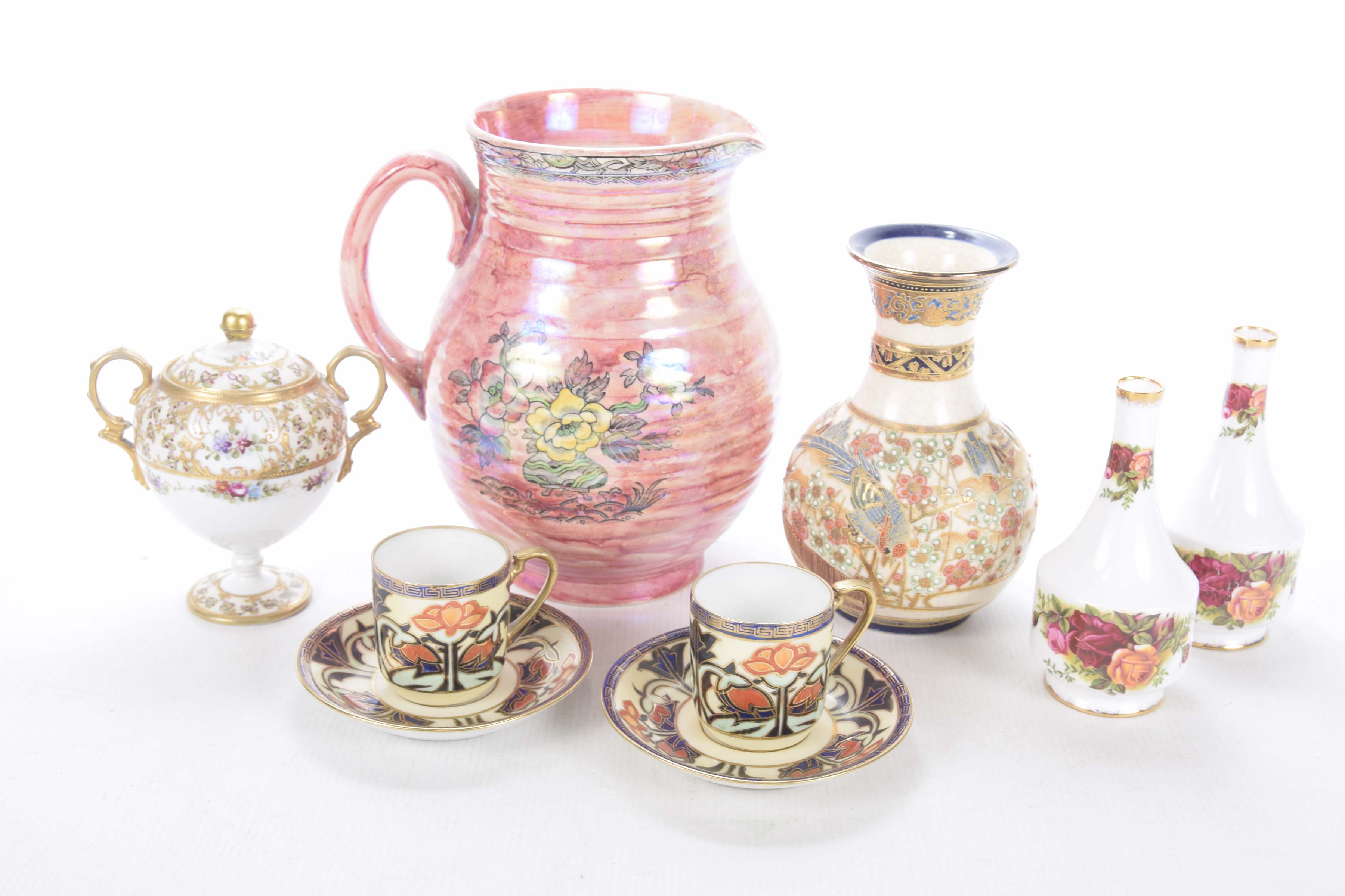 A collection of decorative ceramics To include an Arthur Wood lustre jug,