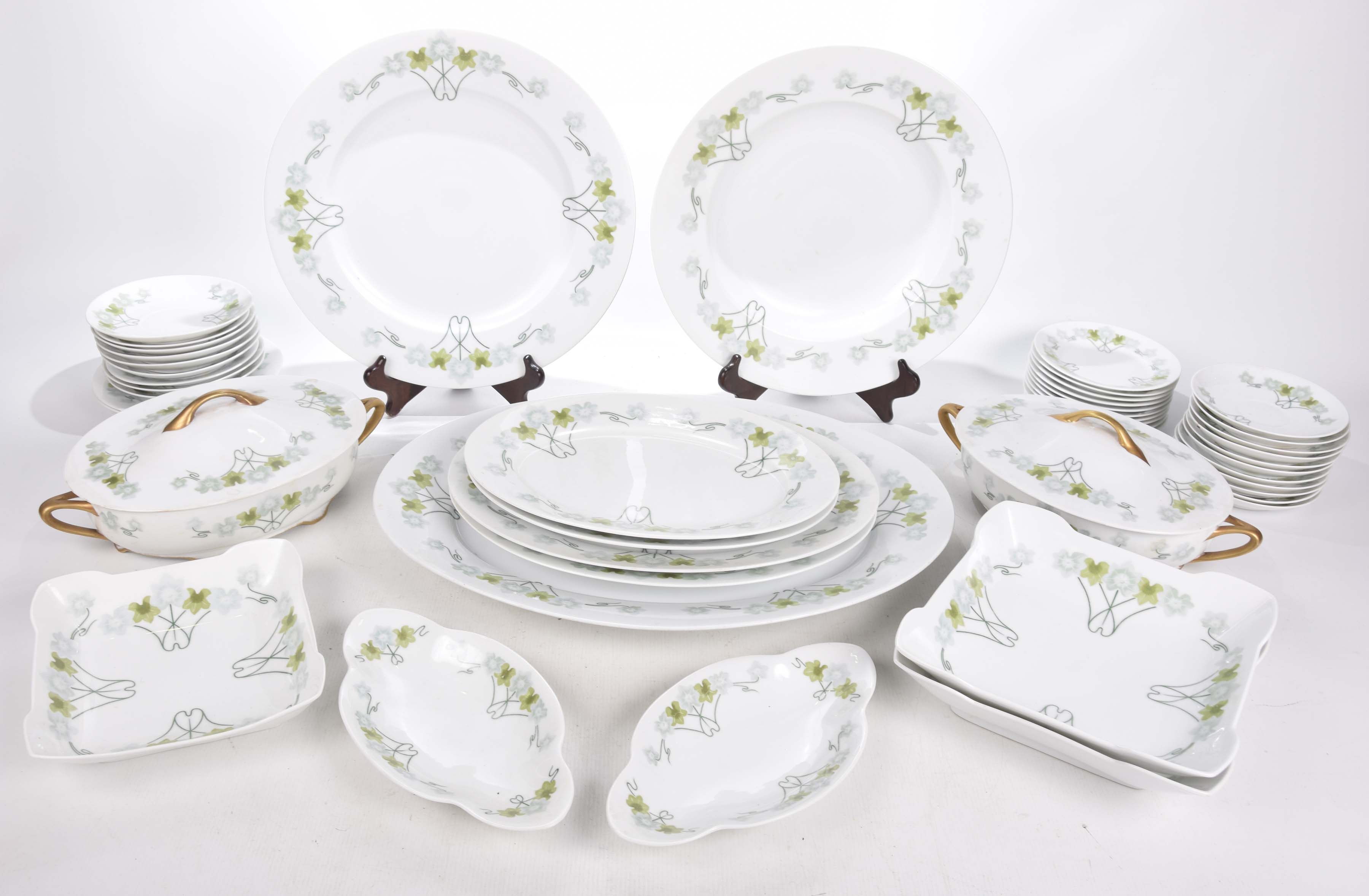 A large quantity of Botticelli ivy pattern dinner wares To include two oval tureens,