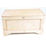 A 19th Century pine blanket chest The rectangular plank top with cleated ends enclosing a fitted